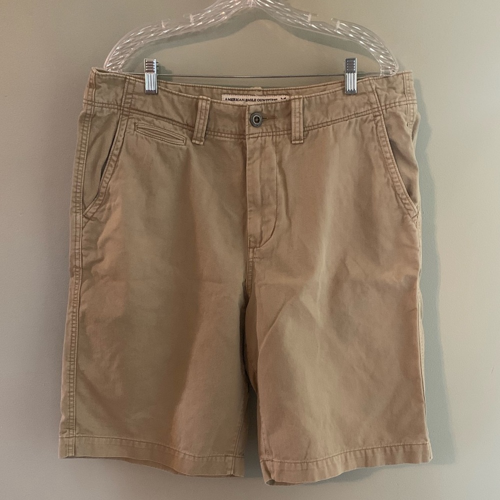 American Eagle outfitters Men’s tan, long shorts, size 36.